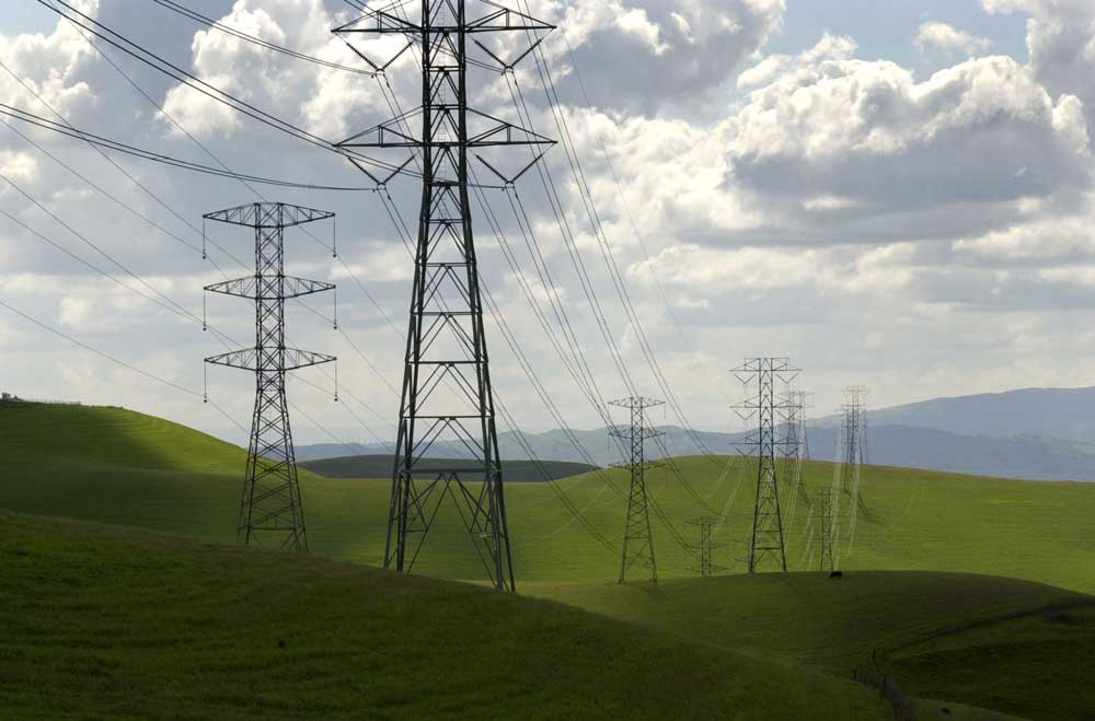 view of tesla towers in field